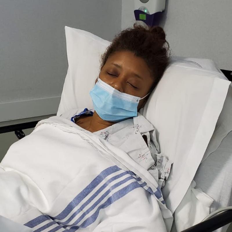Eva in the hospital recovering from her procedure