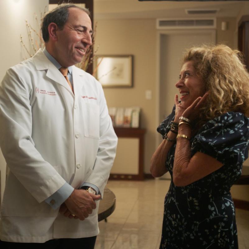 Sandi with her plastic surgeon, Douglas M. Monasebian, MD, FACS