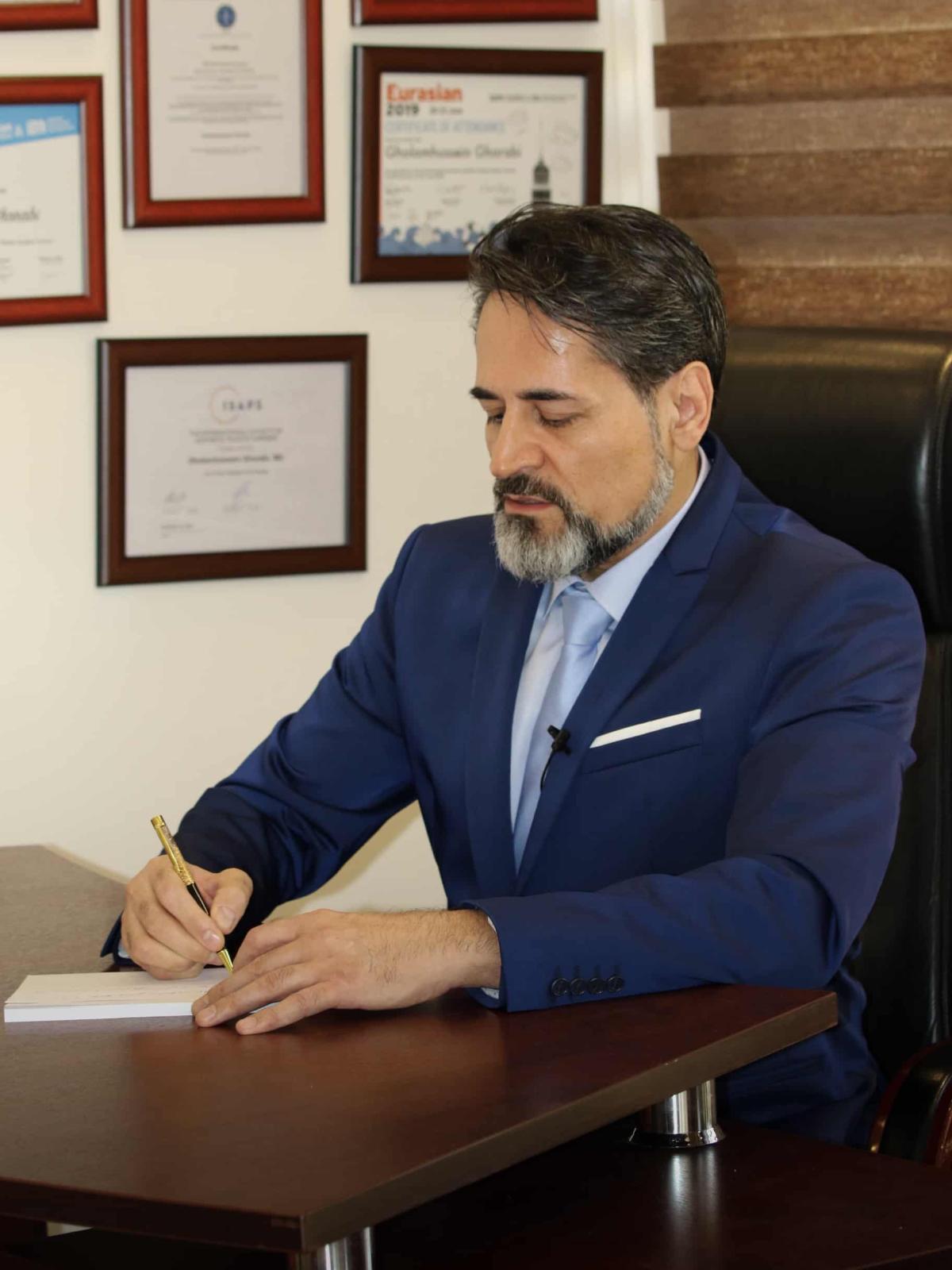 Dr Gholamhossein Ghorabi, MD Professional Background Image