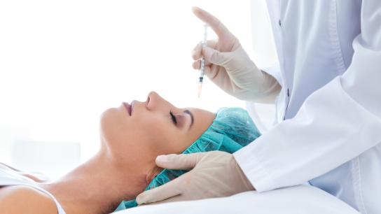Woman getting injectable filler from a plastic surgeon