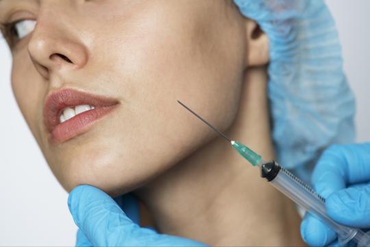 Woman getting safe Botox and Injectable Filler