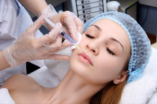 Woman getting dermal filler