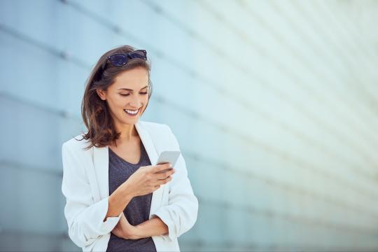 Woman texting on your cell phone