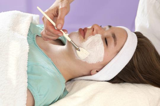 A woman having a chemical peel treatment