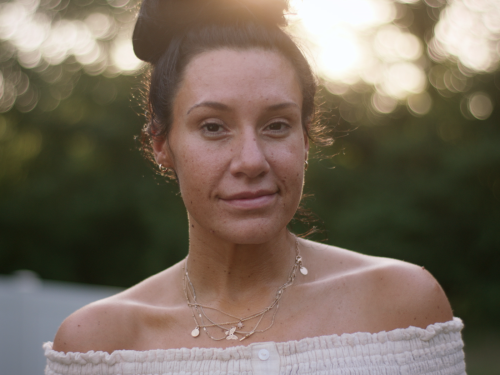 A portrait of Jessica taken outdoors