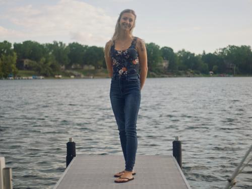 Angel standing on a pier